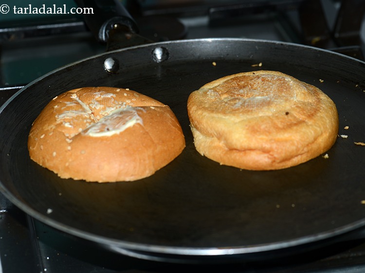 Step 32 – Apply a little spread on the buttered side of all the bun halves.