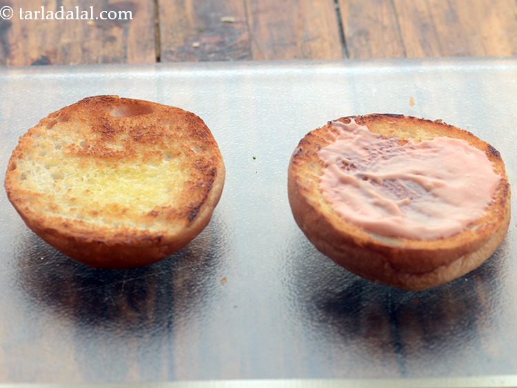 Step 33 – Place a lower halve of the burger bun on a clean, dry surface with the …