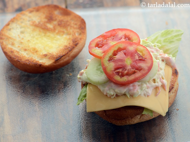 Step 39 – Place 3 tomato slices.