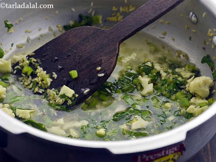 Step 21 – Add &frac34; cup of water for cooking <strong>Vegetable Bulgur Wheat Khichdi for Babies.&nbsp;</strong>