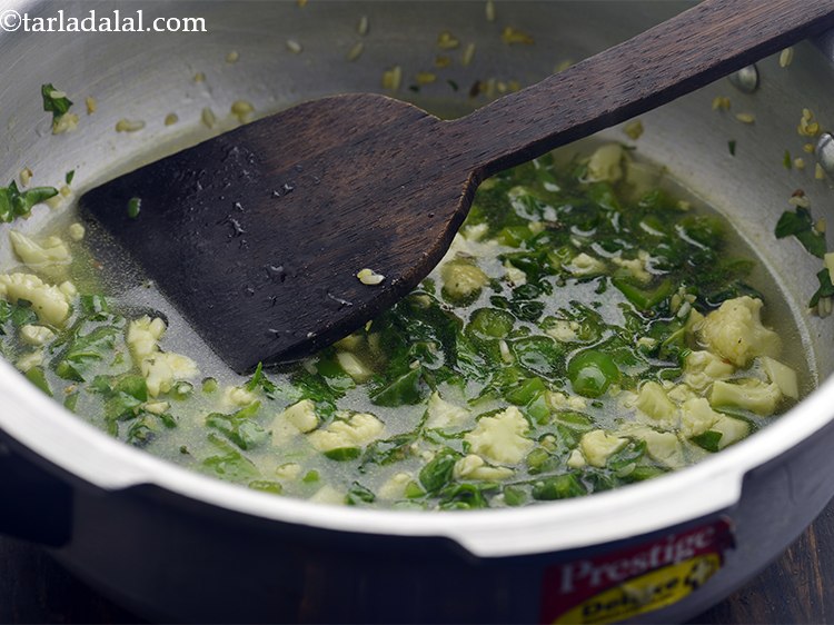 Step 24 – Mix well using a ladle.&nbsp;