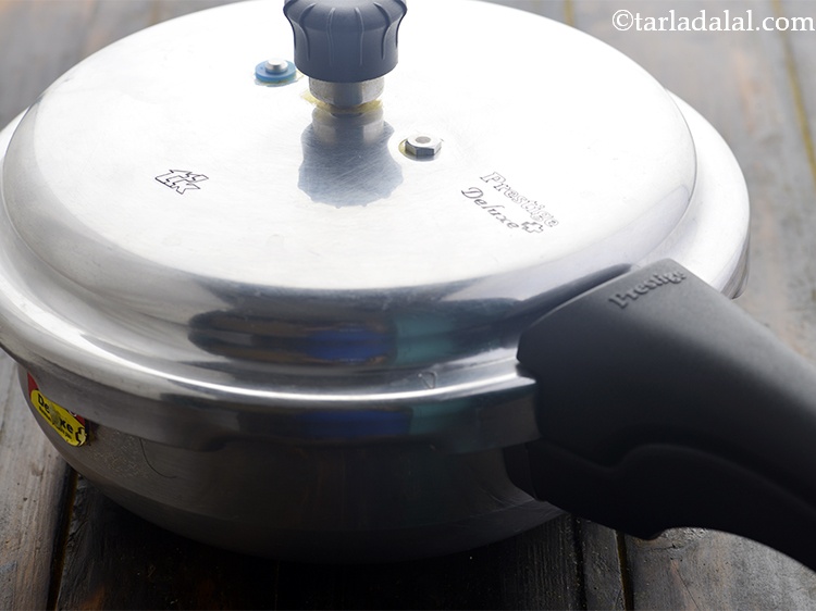 Step 25 – Close the lid of the pressure cooker and allow the <strong>Vegetable Bulgur Wheat Khichdi for …