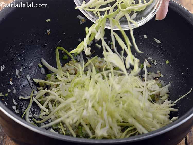 Step 20 – Add the cabbage.