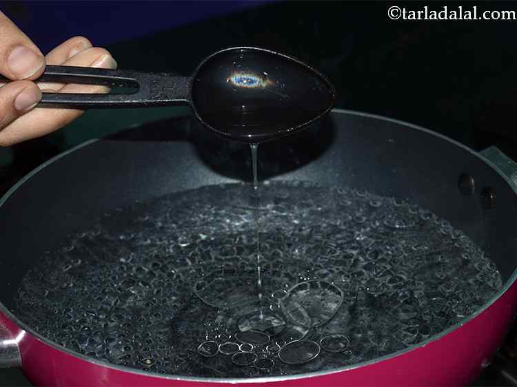 Step 6 – Furthermore, add 1 tbsp of oil and mix well.