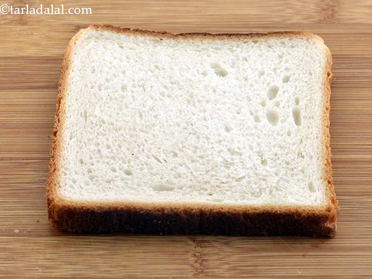Step 16 – Place a bread slice on a clean, dry surface.