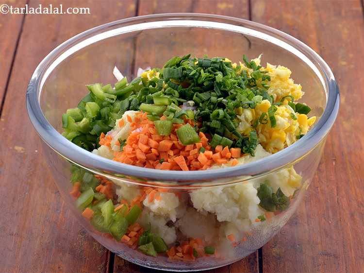 Step 7 – Now add the spring onion greens to it.