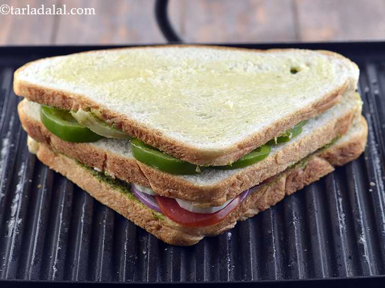 Step 17 – Again spread a little butter on the bread slice.