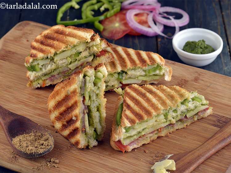 Step 22 – Serve&nbsp;<strong>vegetable grilled sandwich | Mumbai veg grilled sandwich |</strong>&nbsp;immediately with tomato ketchup and green chutney.