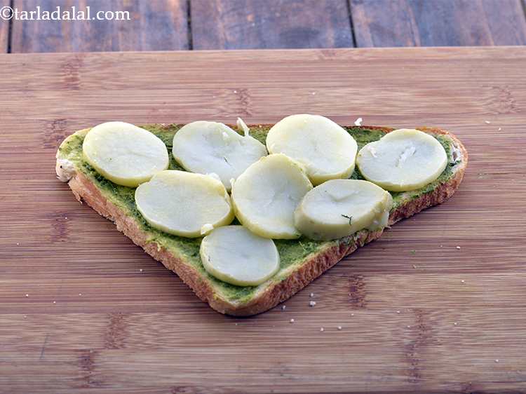 Step 5 – Arrange 8 potato slices over it. Potatoes should be boiled in a pressure cooker, cooled …