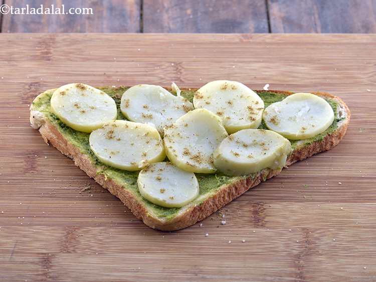 Step 6 – Sprinkle some sandwich masala and salt evenly over it. Sandwich masala can be bought readily …