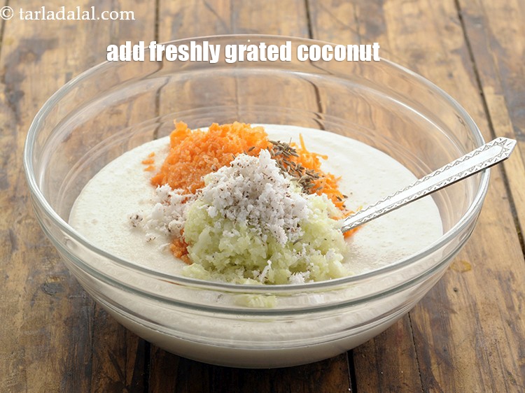 Step 23 – Add freshly grated coconut to it also.