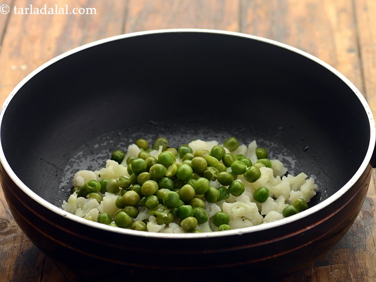 Step 28 – Add the boiled green peas.