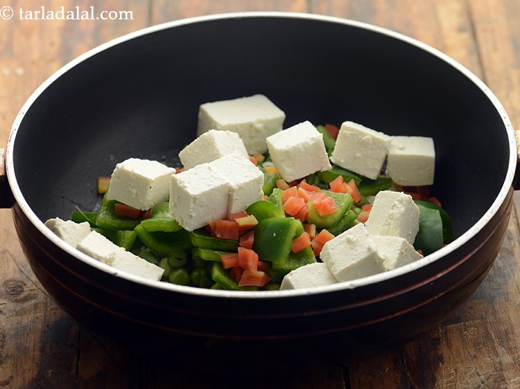 Step 32 – Add the paneer cubes. Learn <a href="https://www.tarladalal.com/Paneer-39276r">how to make fresh homemade paneer</a> using our recipe.