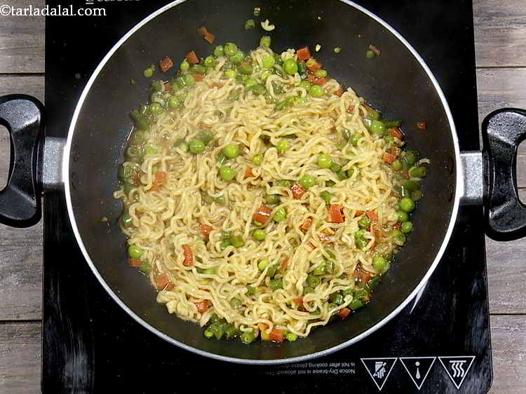 Step 8 – Mix well and cook the noodles on a medium flame for 5 minutes, while stirring …