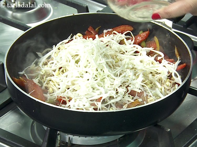 Step 16 – Add cabbage. Shred them not very thin nor very thick.