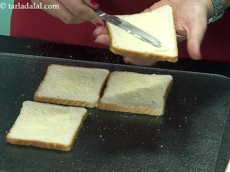 Step 25 – Spread 1 tsp of the butter on each bread slice using a butterknife.&nbsp;