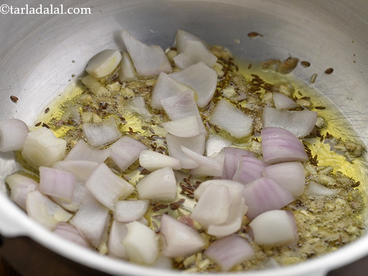 Step 14 – Add the onions and saut&eacute; on a medium flame for 1 minute.