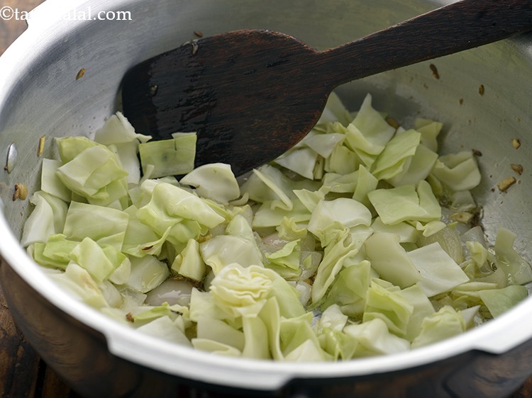 Step 15 – Add the cabbage.