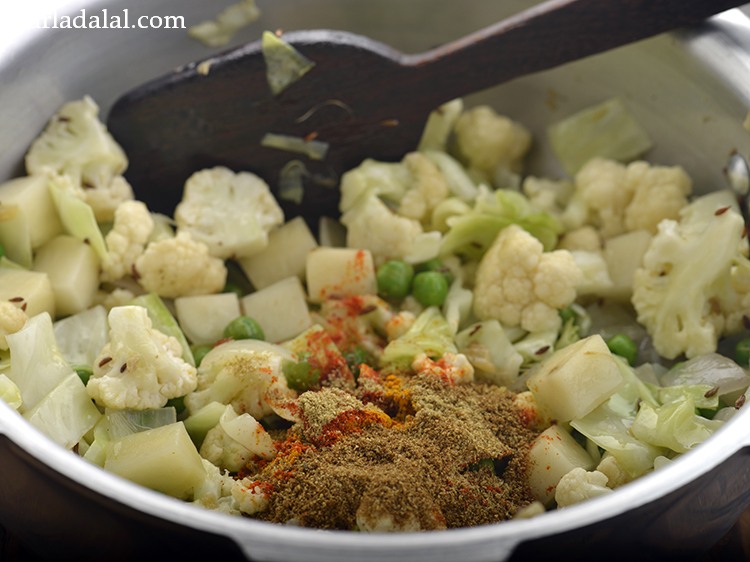 Step 21 – Add the coriander-cumin seeds powder.