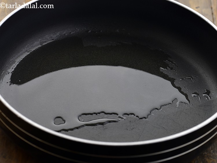 Step 14 – For making the vegetable pasta, heat the olive oil in a broad non-stick pan.