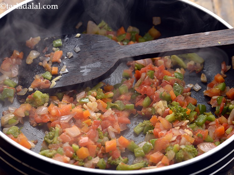 Step 23 – Saut&eacute; everything on a medium flame for 2 minutes.