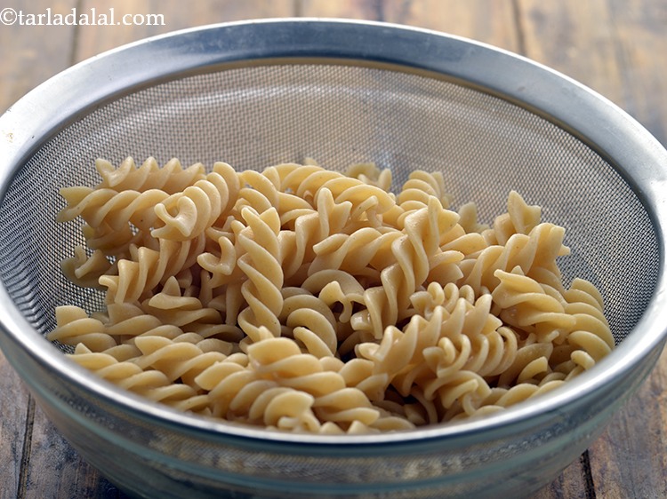 Step 8 – Immediately drain the cooked pasta into a sieve or colander.