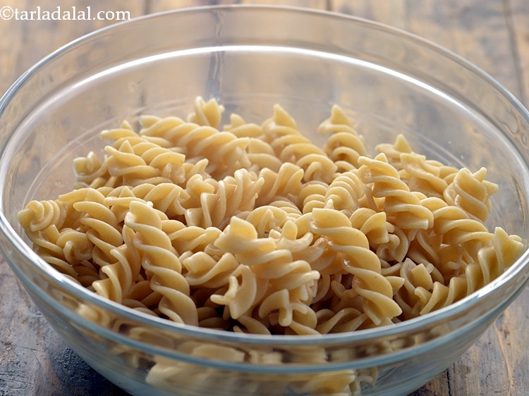 Step 10 – Drain again and keep aside.&nbsp;If the pasta is not to be used immediately, add 1 …