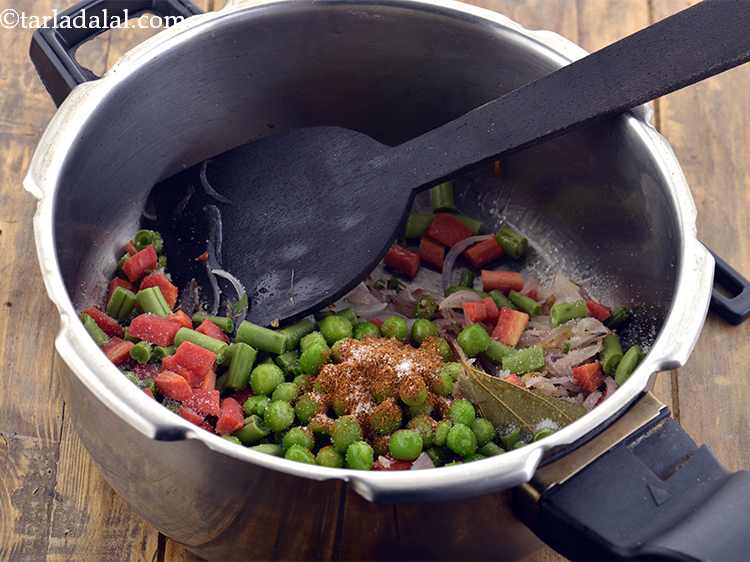 Step 10 – Add the biryani masala and salt to taste.