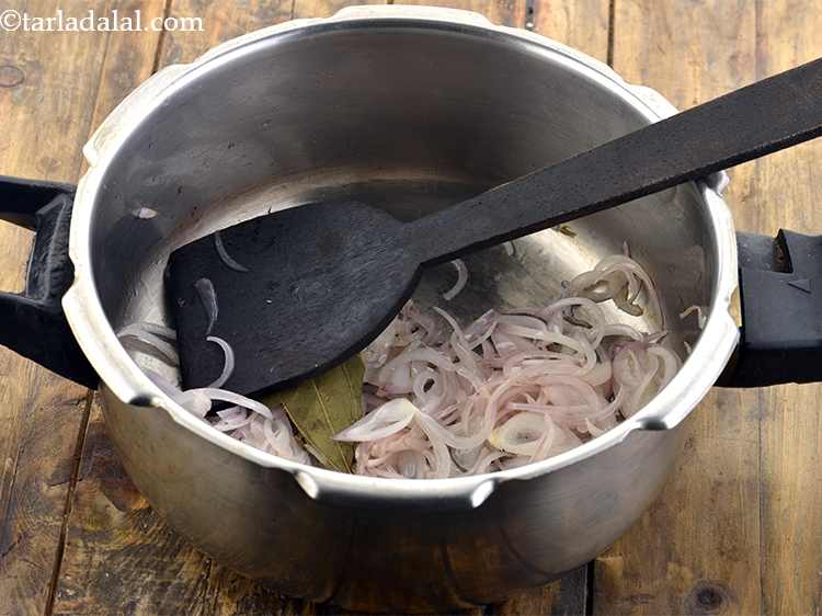 Step 8 – Add the onions and saut&eacute; on a medium flame for 1 minute.