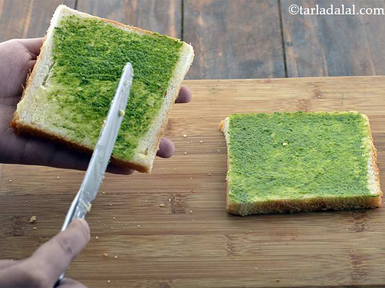 Step 22 – Spread &frac12; tsp of <strong>green chutney</strong> on each buttered bread slice. Use a butter knife …