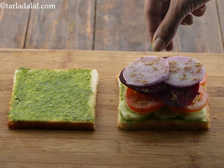 Step 29 – Sprinkle some sandwich masala evenly over it.