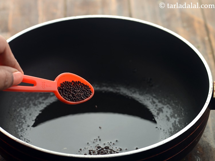 Step 3 – <p>Once the oil is hot, add mustard seeds.&nbsp;</p>