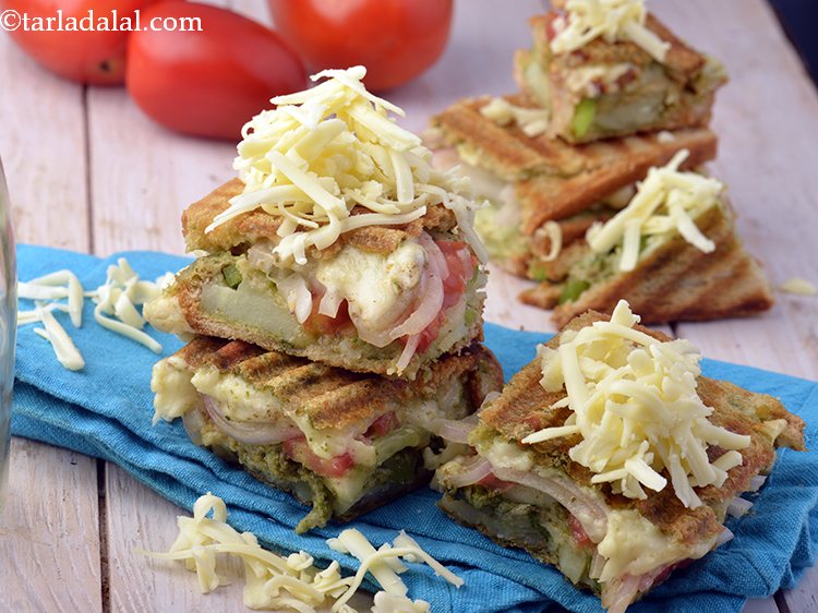 Step 23 – Serve the <strong>veg cheese grilled sandwich</strong> immediately with <a href="https://www.tarladalal.com/Tomato-Ketchup-Tomato-Sauce-Homemade-Tomato-Ketchup-40725r" target="_blank">tomato ketchup</a> and <a href="https://www.tarladalal.com/Green-Chutney-How-To-Make-Green-Chutney-Recipe-22266r" …