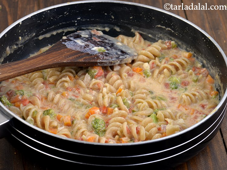 Step 27 – Mix&nbsp;<strong>Healthy Kids Vegetable Pasta&nbsp;</strong>well and cook on a medium flame for 2 to 3 minutes, …