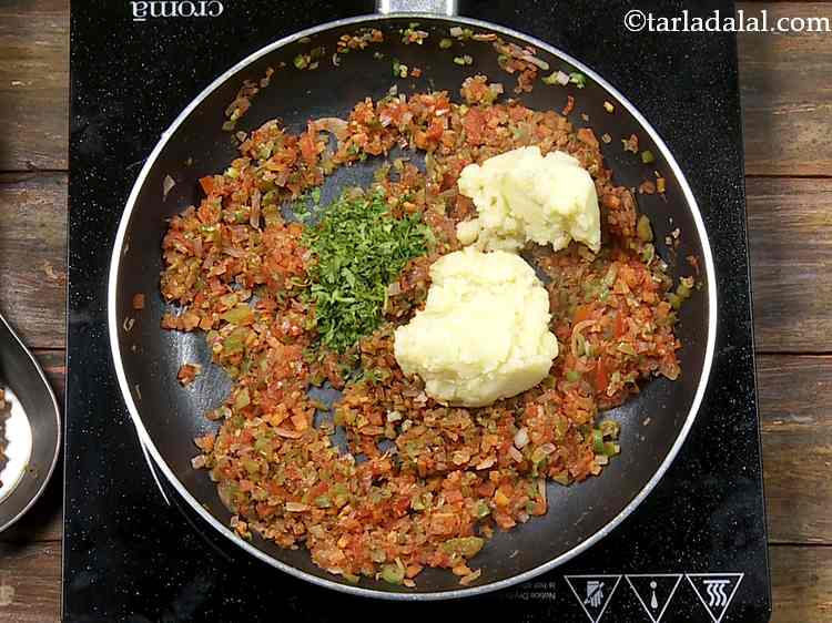 Step 9 – Add the boiled and mashed potato to the vegetables. This will give volume and texture …
