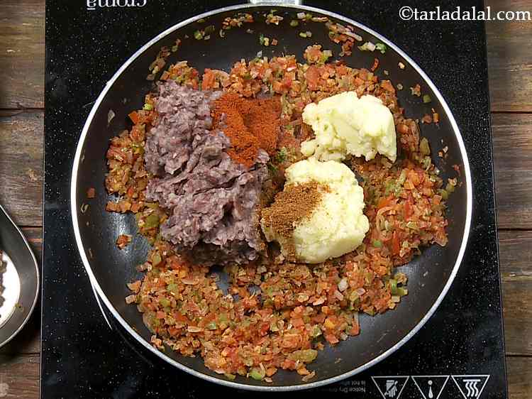 Step 11 – Now add the spices - chilli powder and garam masala. Both these masalas give a …