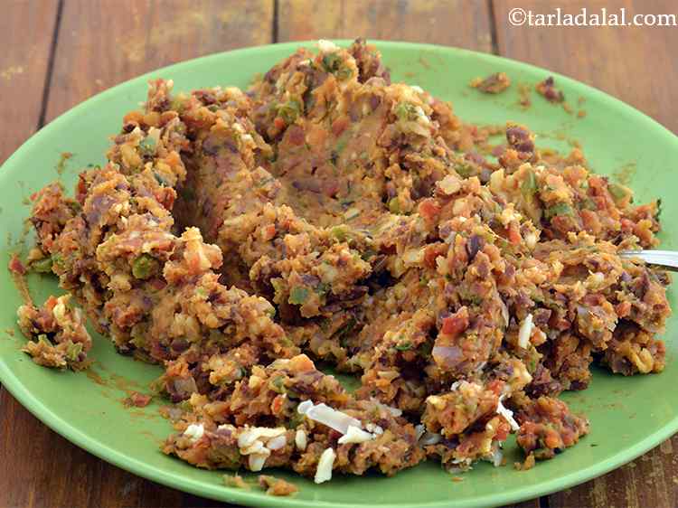 Step 16 – Once the mixture cools completely, add the cheese and mix well with your hands till …