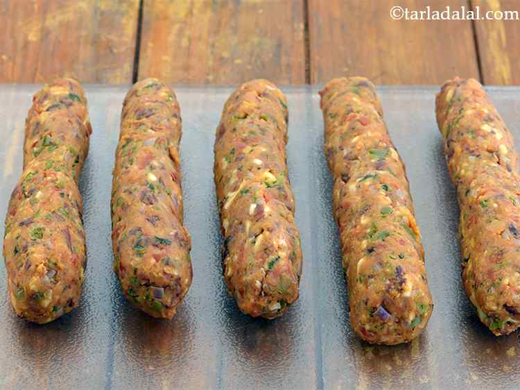 Step 18 – Roll a portion between your palms to form a cylindrical roll. Be careful as to …