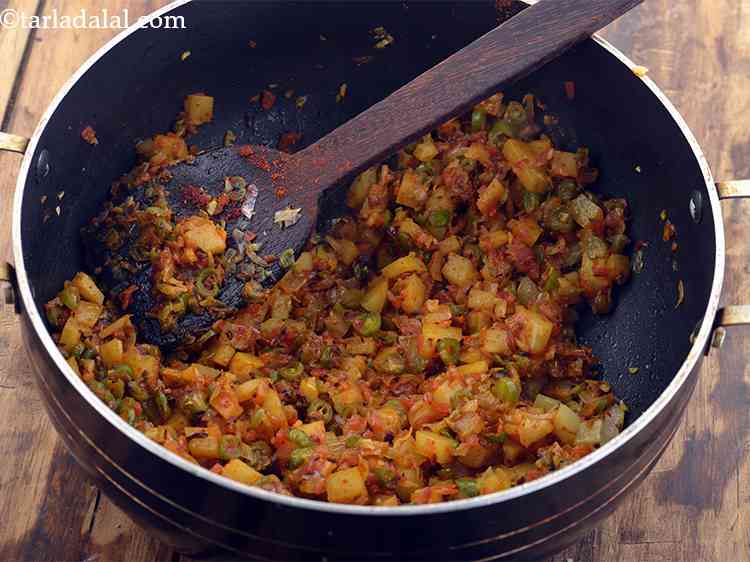 Step 10 – Saut&eacute; on a medium flame for 1 minute.