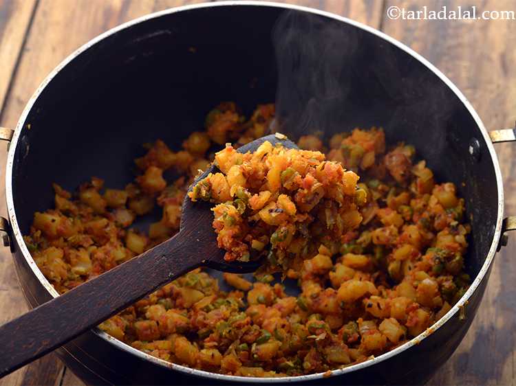 Step 11 – Add &frac14; cup of plain flour and mix well. Cook on a medium flame for …