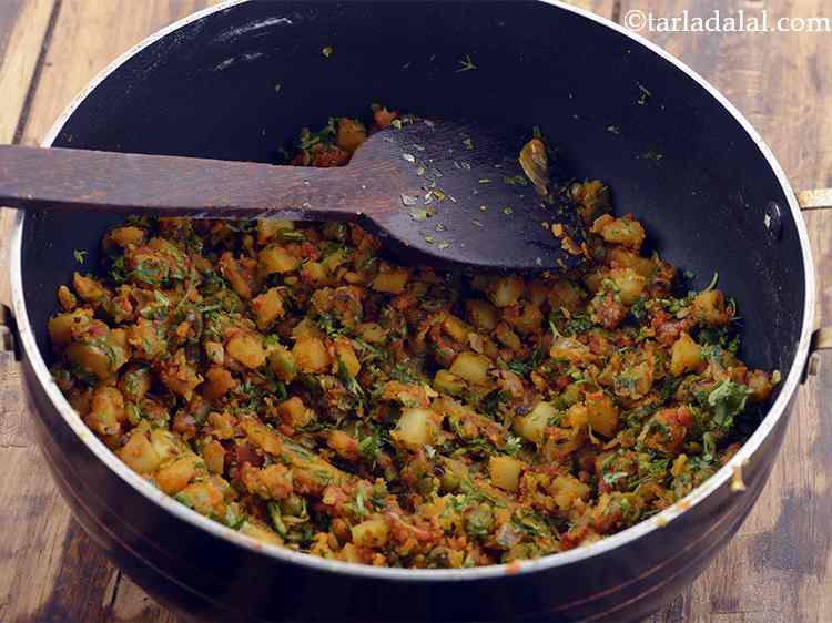 Step 12 – Remove from the flame and add the coriander. Mix well. Your <strong>veggie burger cutlet mixture</strong> …