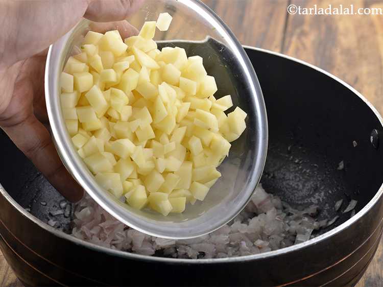 Step 2 – Add the potatoes.