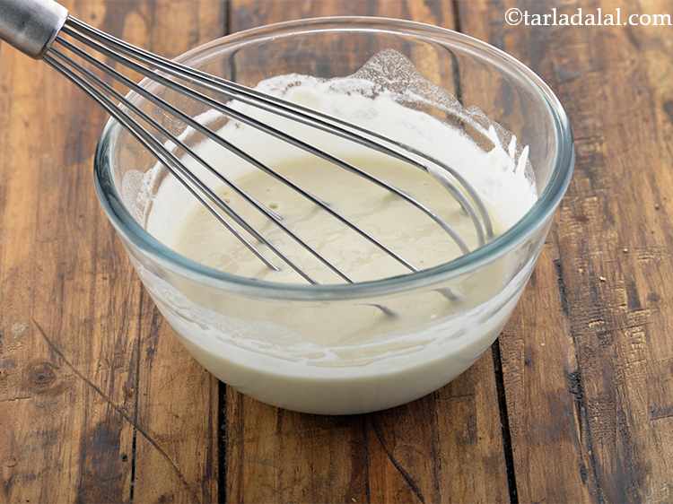 Step 17 – Mix it well using a whisk till no lumps remain. The batter should be little …