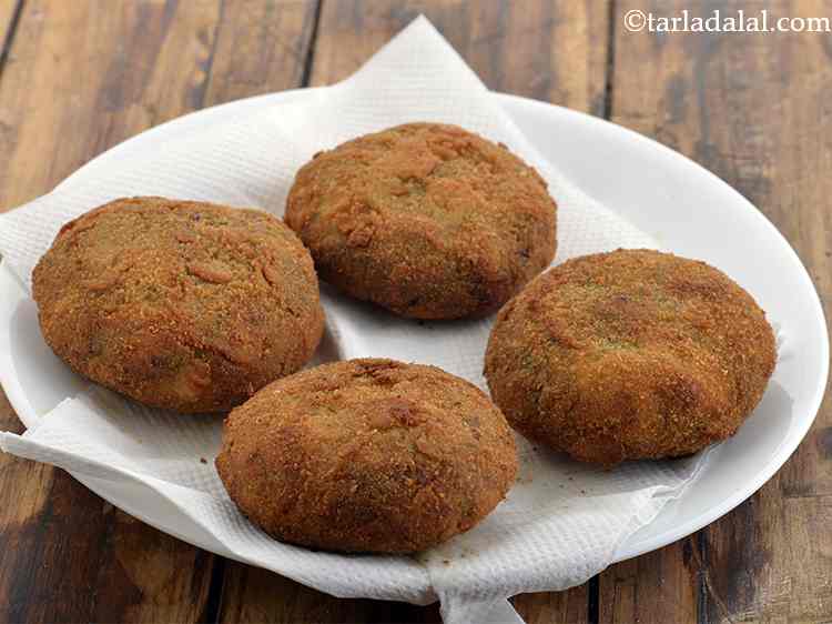 Step 23 – Deep-fry each cutlet till it turns golden brown in colour from both the sides. Do …