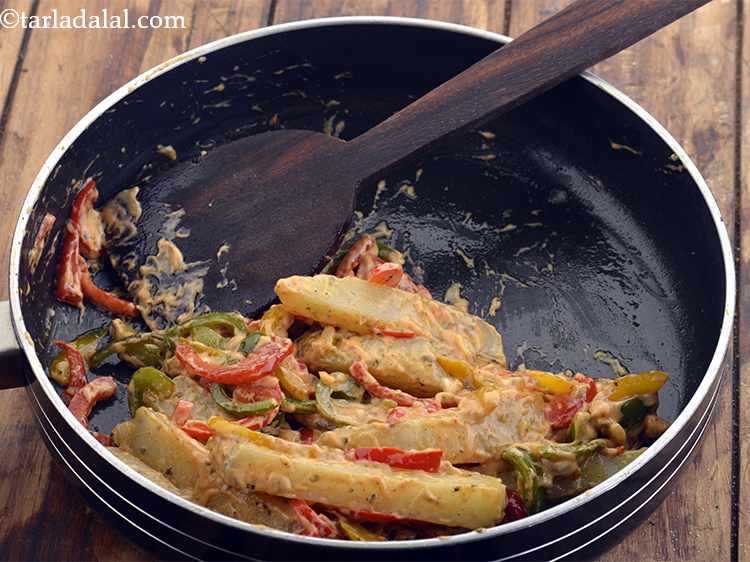 Step 34 – Add half of the chilli mayo spread and mix it gently. If you mix vigorously, …