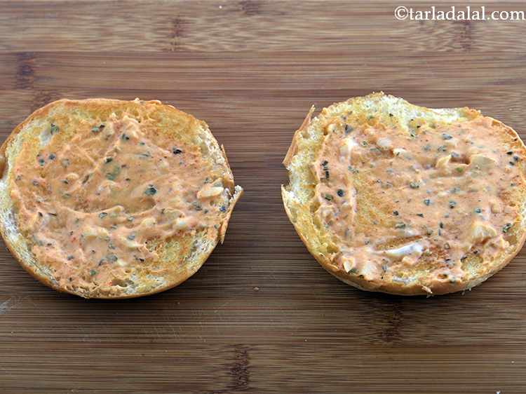 Step 41 – Apply &frac34; tbsp of the chilli mayo spread on each buttered side of the bun …