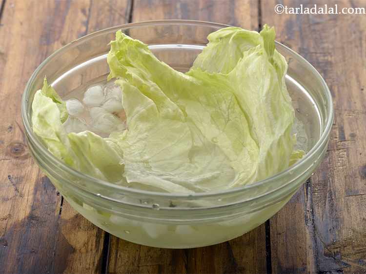 Step 36 – To assemble the veggie burger, submerge the lettuce leaves in a bowl of ice- cold …