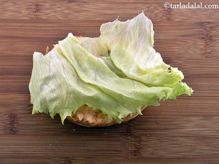 Step 42 – Using a kitchen towel, dry the lettuce leave completely. Place one lettuce leaf on the …