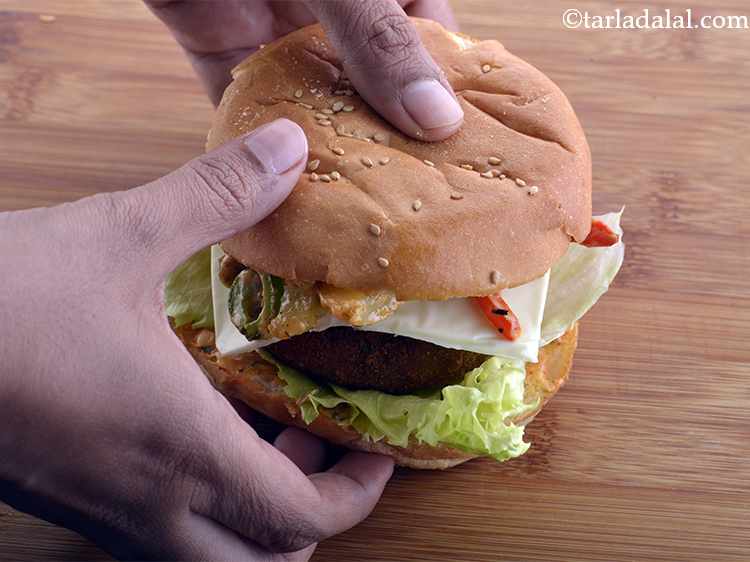 Step 47 – Press it lightly. You can even secure the <strong>veggie burger</strong> with the help of a …