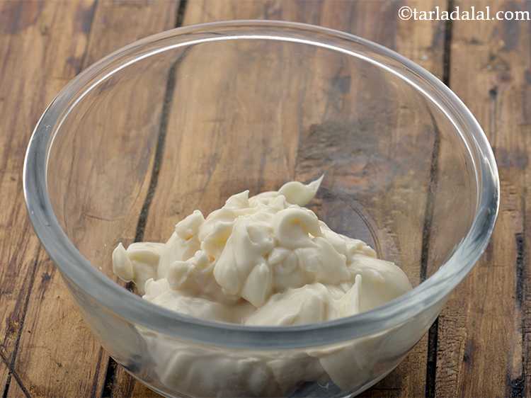 Step 24 – For the <strong>chilli mayo spread of the veggie burger</strong>, take a medium sized bowl, add …